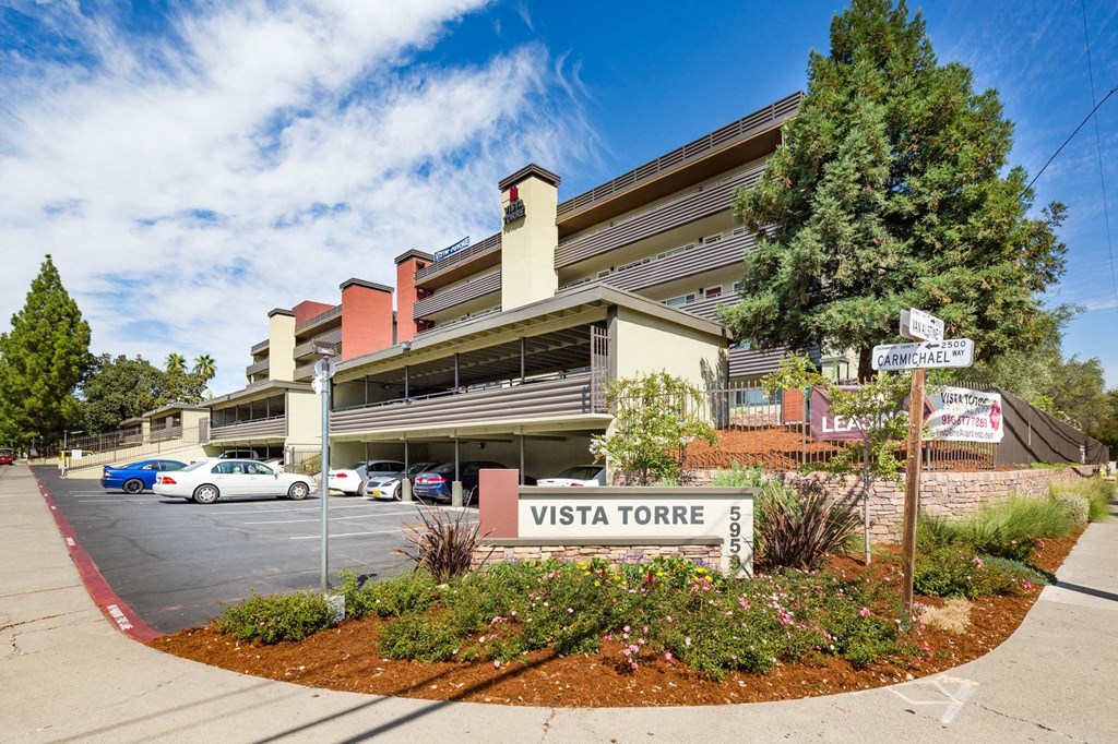 a view of the front of a building with a sign that says visit torre