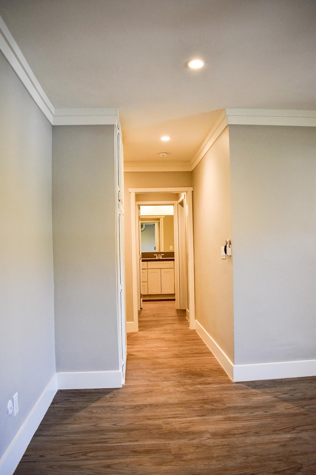 View into hallway leading to bathroom