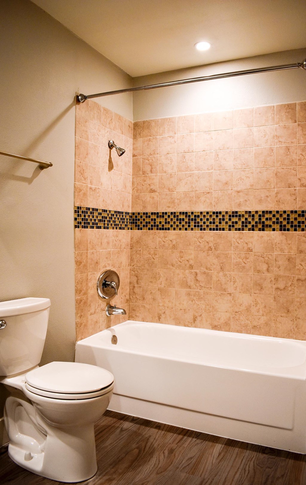 View of tiled bathroom shower tub