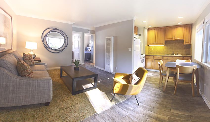 View from living area into kitchen and bedroom