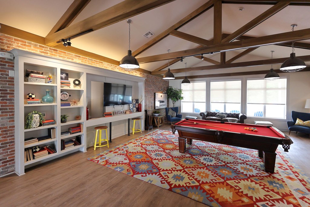 Pool Table In Game Room at Midtown Sam Houston Apartments, Huntsville, TX, 77340