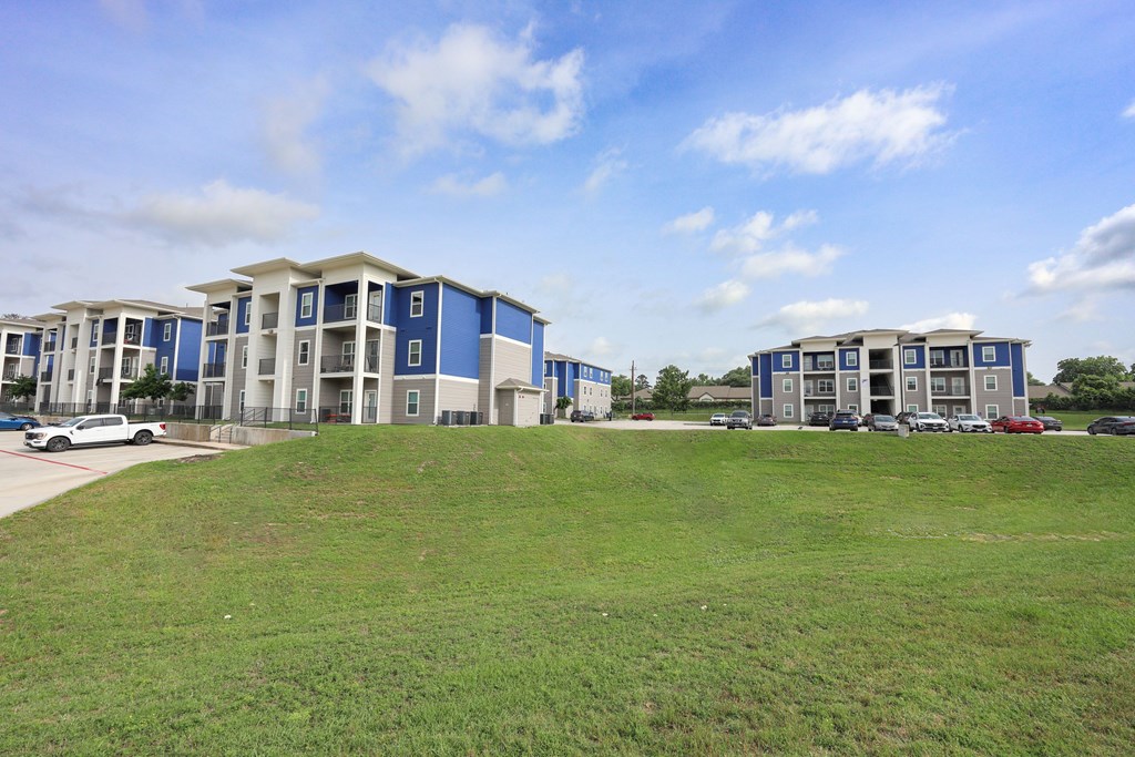 A Large Grassy Area at Midtown Sam Houston Apartments, Texas, 77340