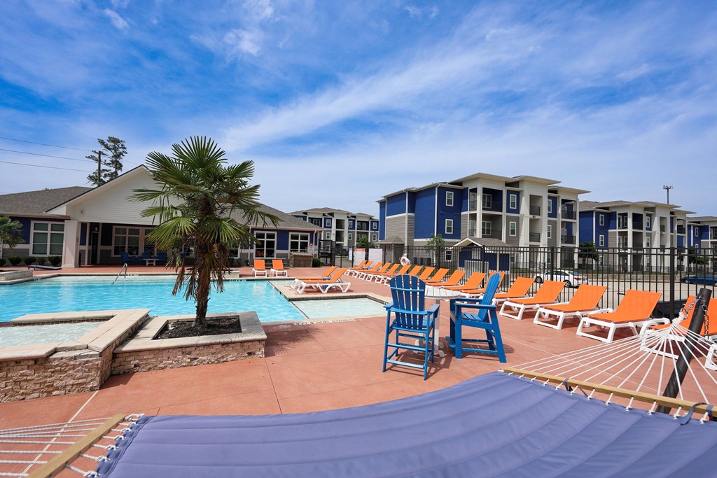 Swimming Pool With Relaxing Sundecks at Midtown Sam Houston Apartments, Huntsville, Texas