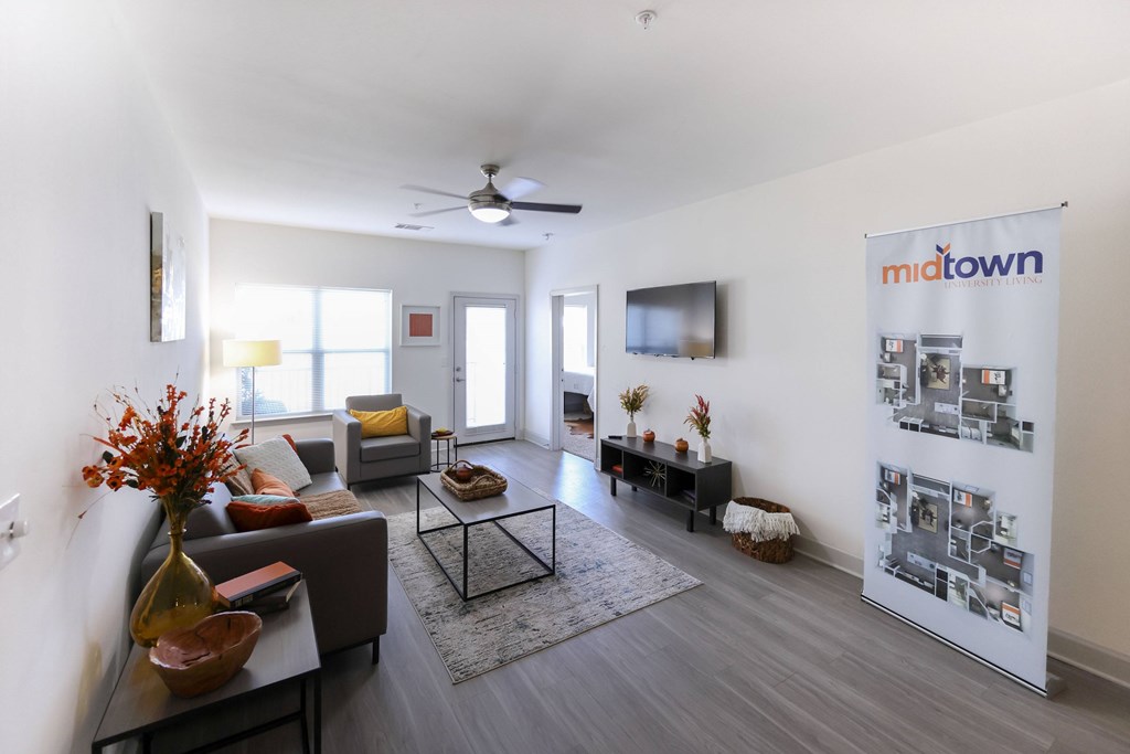 Bright Living Room at Midtown Sam Houston Apartments, Huntsville, TX