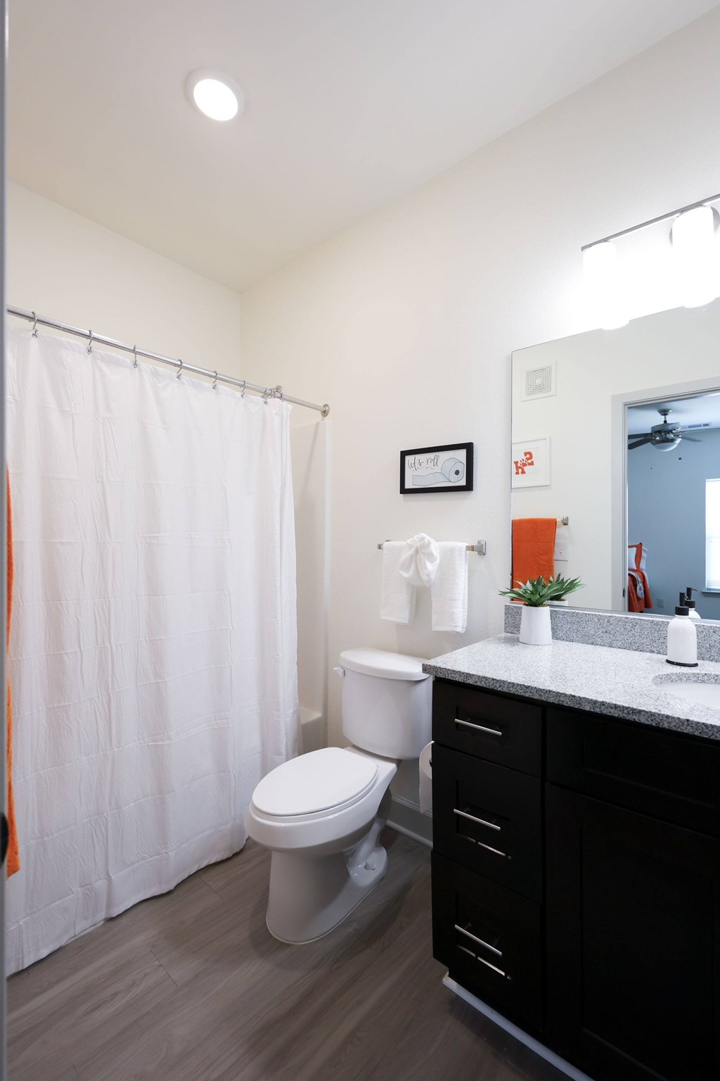 Bathroom With Storage Space at Midtown Sam Houston Apartments, Huntsville, TX, 77340