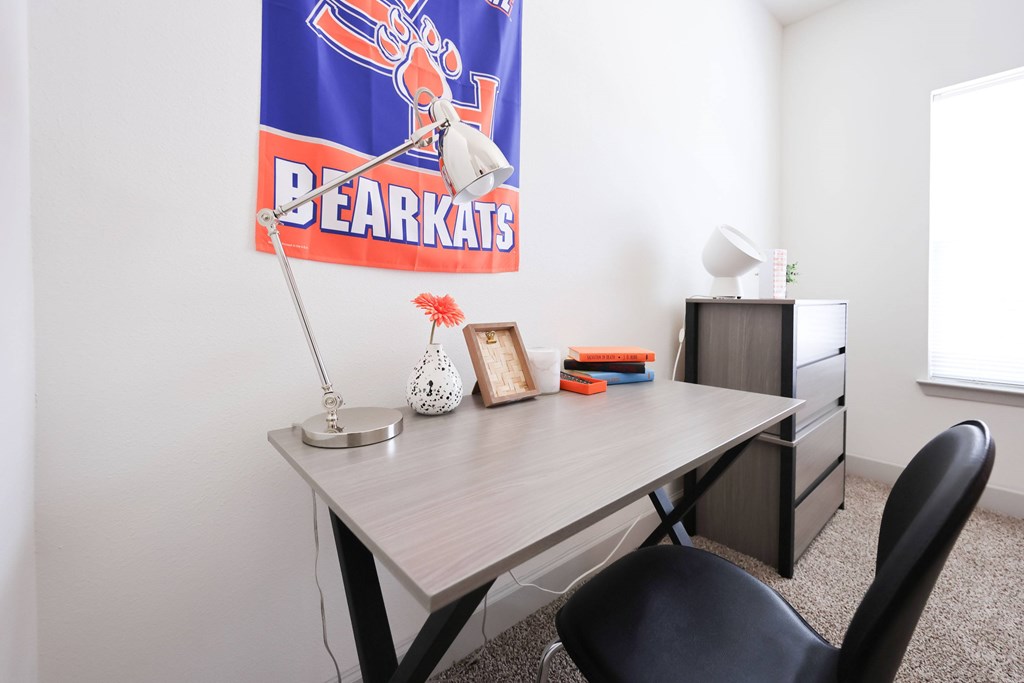 Strong And Sturdy Study Table at Midtown Sam Houston Apartments, Huntsville, TX