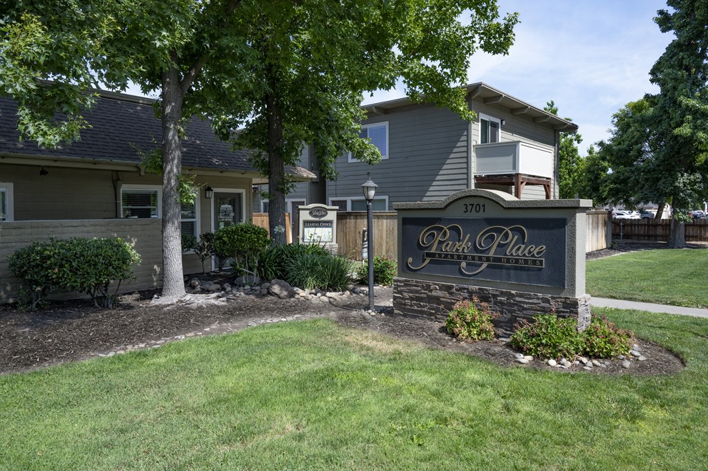 the park place sign in front of a house