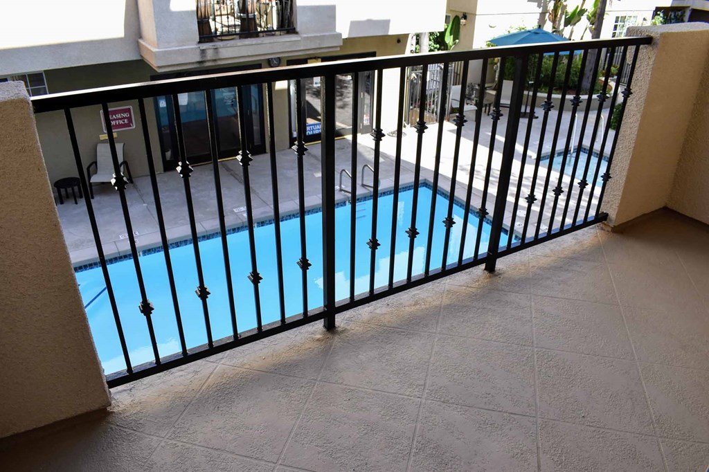 View from private balcony into community pool