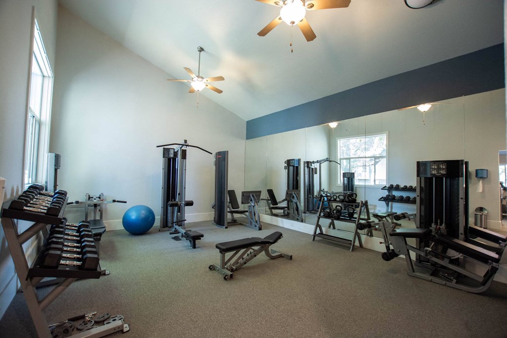 Selby Ranch fitness center located at the clubroom with free weights and weight machines