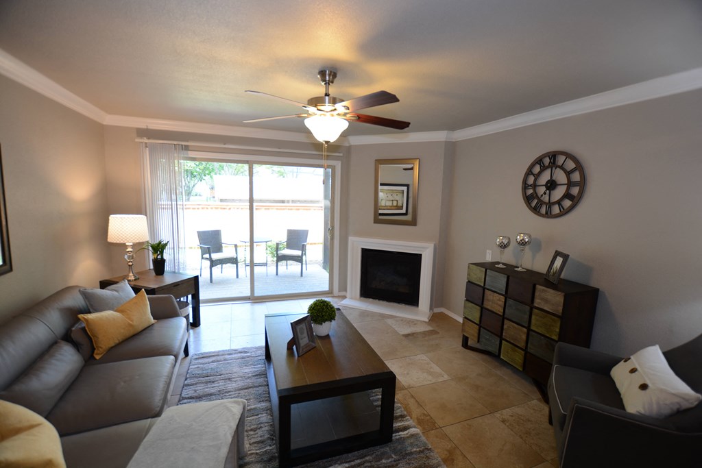 View of living room overlooking the private patio/balcony