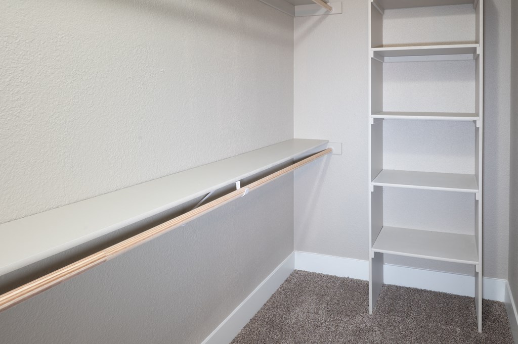 a room with a shelf and a closet at Sierra Oaks Living Apartments, Cameron Park, CA