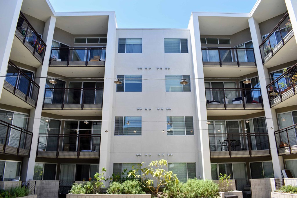 a view of the balconies of an apartment building