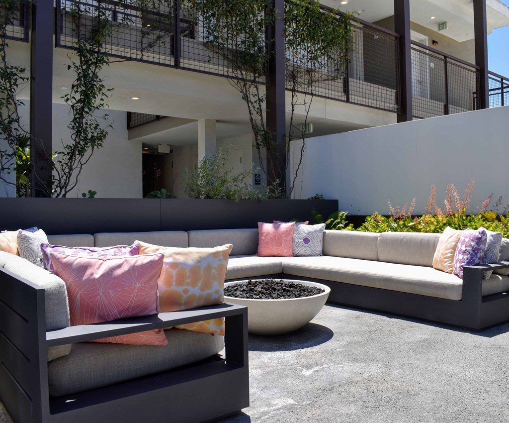 a seating area with couches and a coffee table