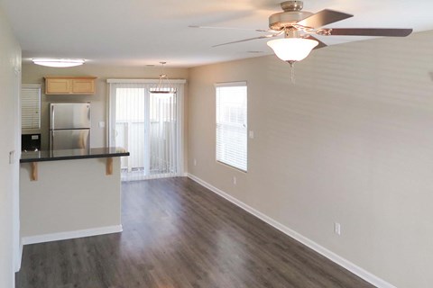 view from living room towards kitchen and patio door