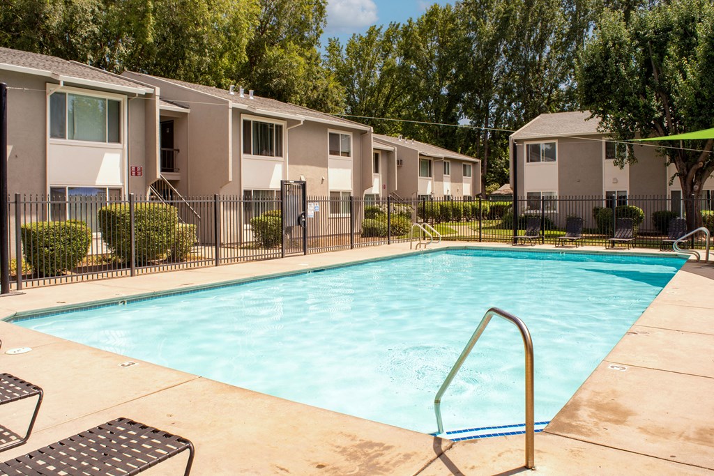 our apartments have a swimming pool with a fence around it