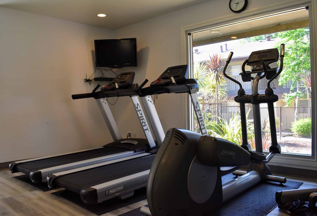 a gym with cardio equipment
