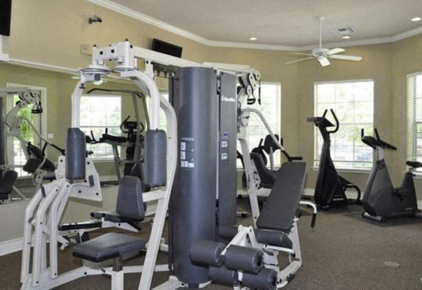 View of community gym with fitness equiptment