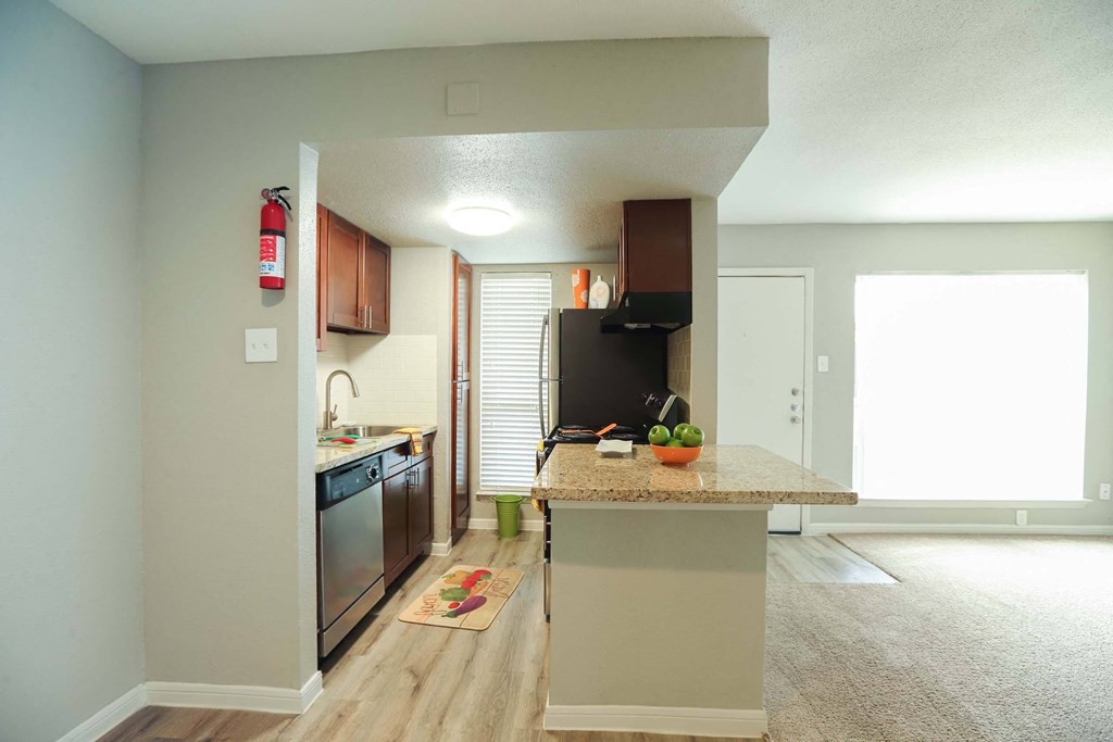 View of the kitchen and wide countertops at Willow Creek Apartments, Houston, Texas