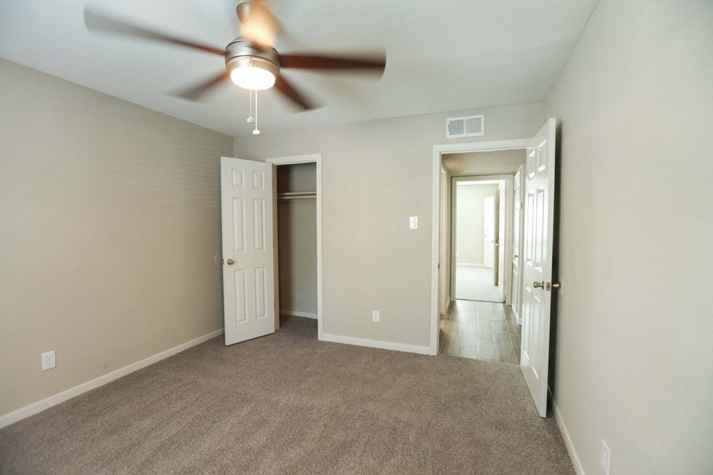 Large bedroom with walk in closet at Willow Creek Apartments, Houston