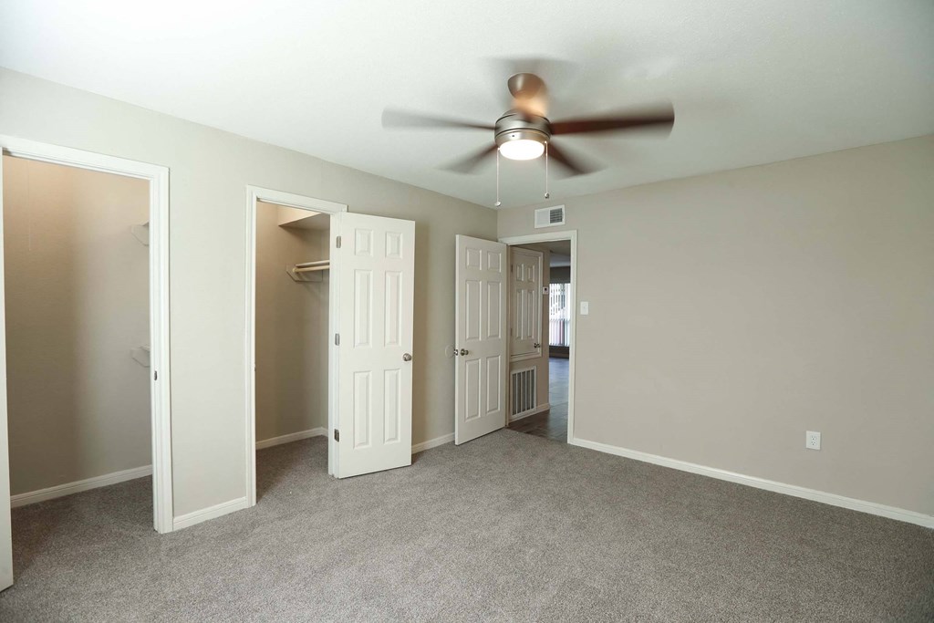 Large bedroom and walk in closet at Willow Creek Apartments, Houston, Texas