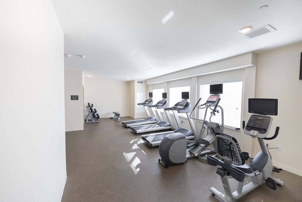 the gym has cardio equipment and treadmills in it the gym has cardio equipment and treadmills in it at Parks Residential - Richardson, Richardson, 75082