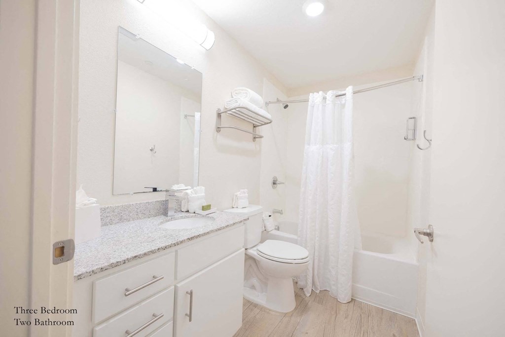 a white bathroo at Parks Residential - Richardson, Richardson, TX, 75082