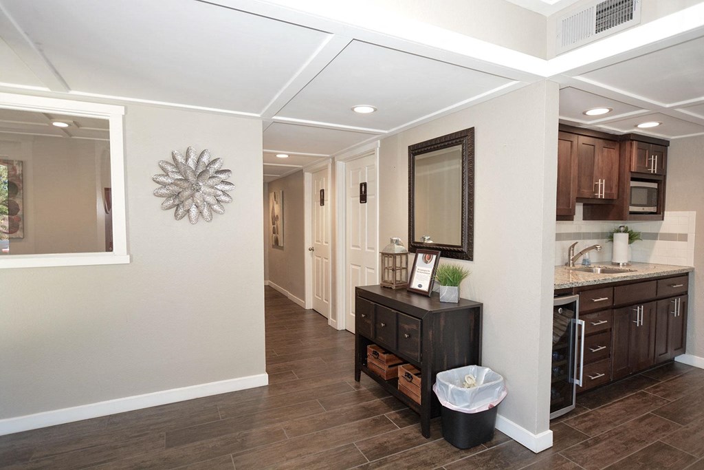 View of leasing area kitchen and hall