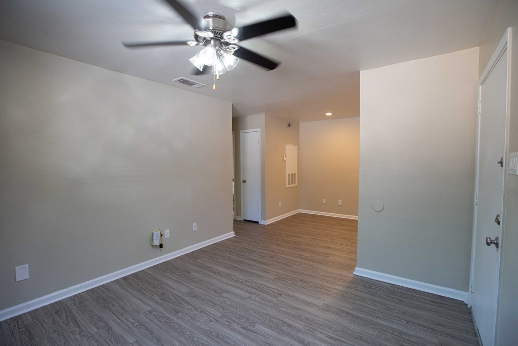 Rolling Brook Living Room with wood look flooring and ceiling fan
