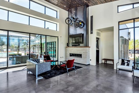 Clubhouse with TVs and Entertainment Area at The Premiere at Dana Park, Arizona