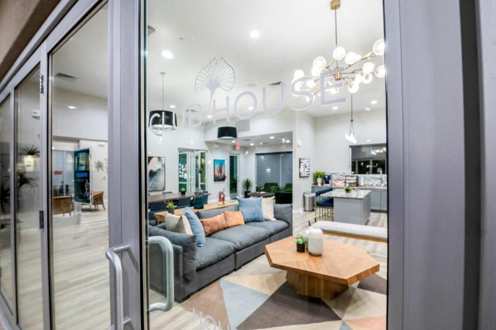 a living room with a couch and a table at Inspiration Apartments, Arizona