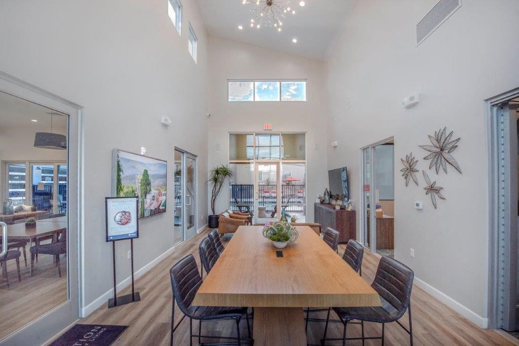 a large dining room with a wooden table and chairs at Inspiration Apartments, Cottonwood, AZ, 86326