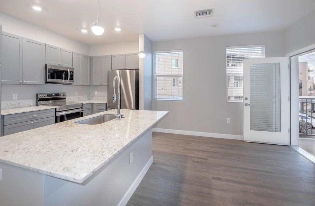 a kitchen with a sink and a refrigerator at Inspiration Apartments, Arizona, 86326