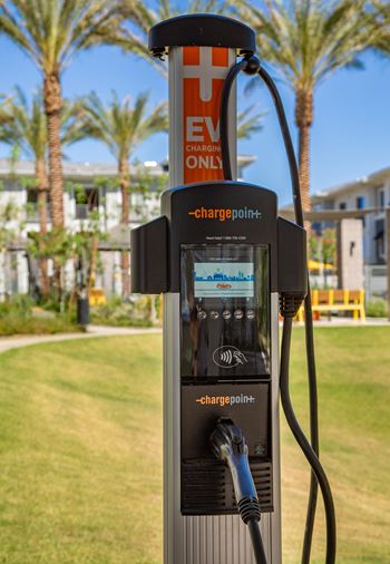 A ChargePoint electric vehicle charging station with a sign that says "EV CHARGING ONLY".