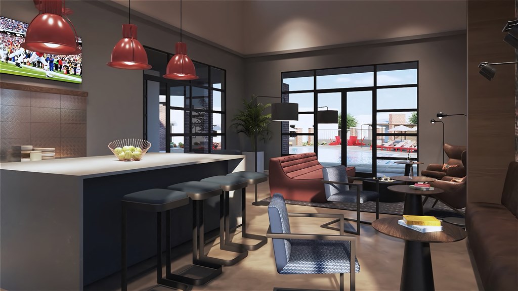 a rendering of a clubhouse with a bar and couches at Marketside Villas at Verrado, Buckeye