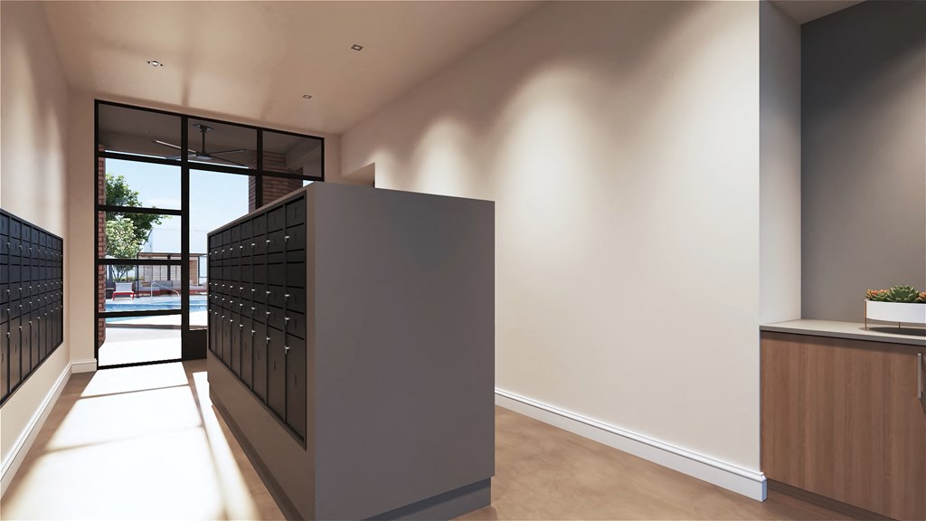 a large dark grey reception desk with a glass door at Marketside Villas at Verrado, Buckeye, 85396