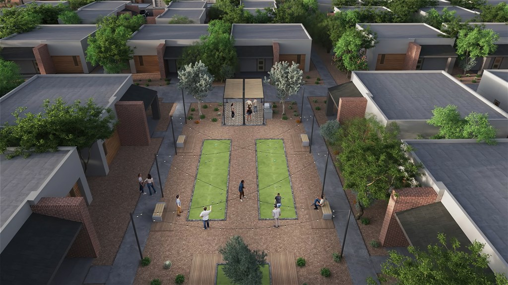 an aerial view of a courtyard with people playing tennis at Marketside Villas at Verrado, Buckeye Arizona