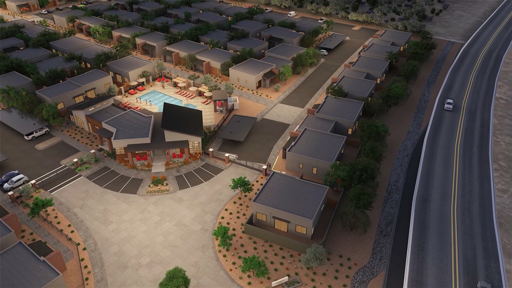 an aerial view of a resort style community with a swimming pool at Marketside Villas at Verrado, Buckeye Arizona