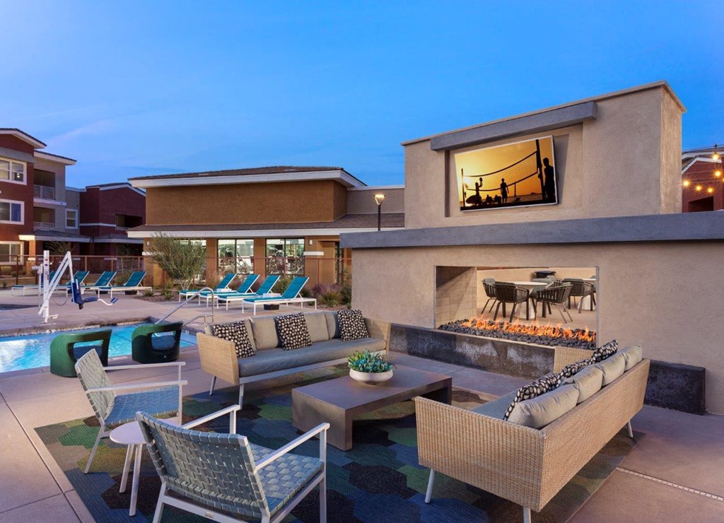 a patio with couches and chairs and a fire place at Zaterra Luxury Apartments, Chandler, AZ, 85286