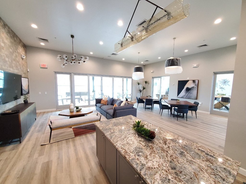 an open floor plan with a kitchen and living room at Inspiration Apartments, Cottonwood, AZ, 86326