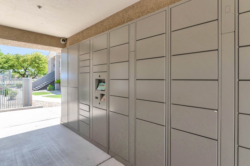 A row of lockers are lined up in a room.