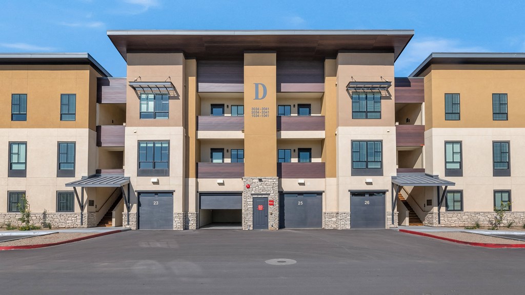 a building with a parking lot in front of it