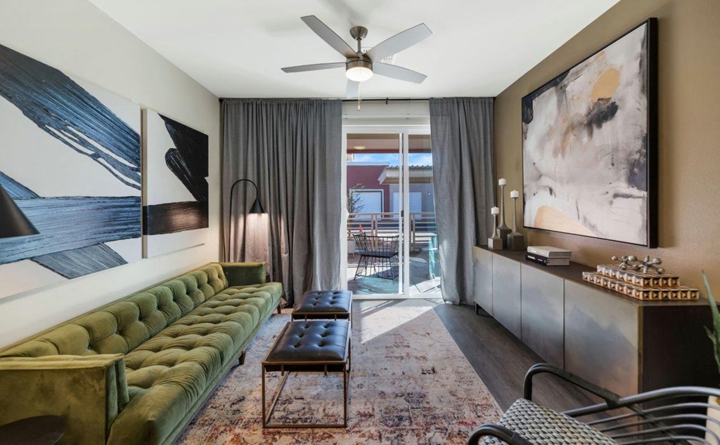 Living room decor with ceiling fan and light at Zaterra Luxury Apartments, Arizona