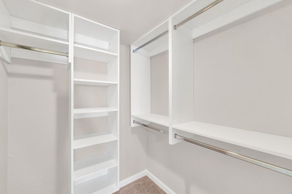 a walk in closet in a 555 waverly unit