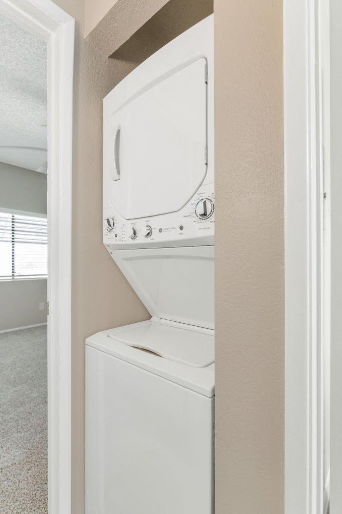 a white washer and dryer in a room
