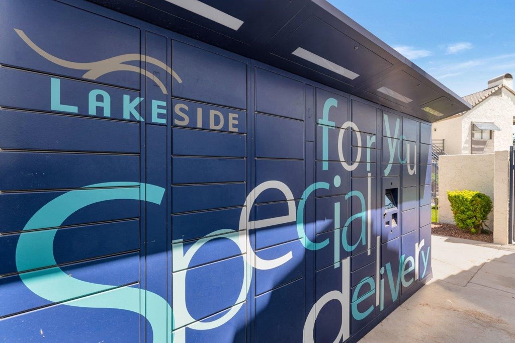 a blue garage door with a sign that reads lakeside garage