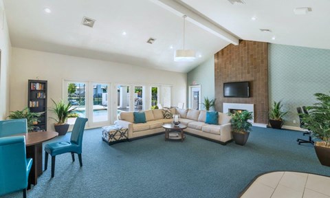 a living room with a couch and a table