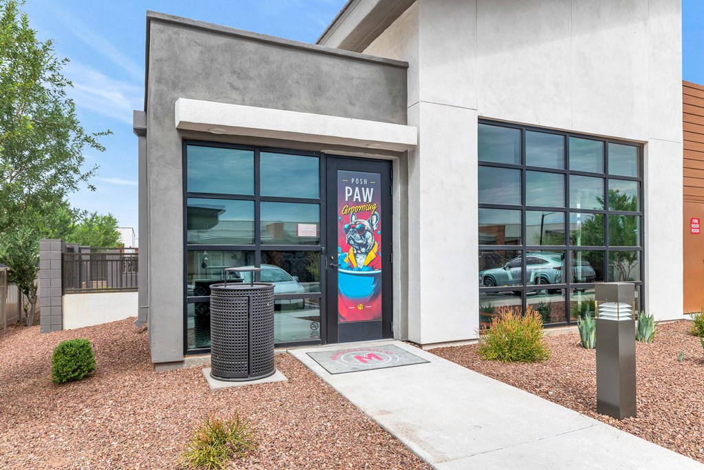 A building with a large window and a sign that says at Marketside Villas at Verrado, Buckeye, AZ