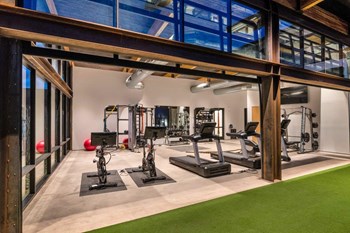 Cardio Studio Equipment Cardio Studio Equipment at The Premiere at Eastmark Apartments, Mesa, Arizona - Photo Gallery 4