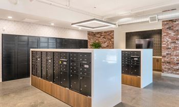 an image of the inside of a building with a bunch of lockers at The Common Apartments, Arizona