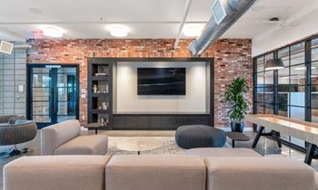resident lounge with television at  The Common Apartments, Phoenix, Arizona